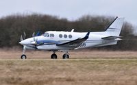 M-TSRI @ EGFH - Visiting King Air operated by Timpson Ltd departing Runway 22. - by Roger Winser