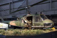 64-15476 @ KFFO - Huey ‘492’ is painted to represent a 20th Special Operations Squadron “Green Hornets” helicopter that rescued a seven-man team of Green Berets on Nov. 26, 1968 in Vietnam.  The pilot, 1st Lt. J. Fleming was awarded the Medal of Honor for the mission. - by Arjun Sarup