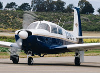 N3487X @ KHAF - 1966 Mooney M20C taxing for departure at Half Moon Bay Airport Day 2018. - by Chris Leipelt