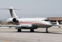 N503VJ @ KMRY - 2013 Global 5000 taxing out for departure at Monterey Regional Airport. - by Chris Leipelt