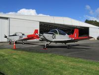 ZK-DGY @ NZAR - and friend - parked up at museum hangar - by magnaman