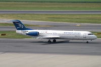 4O-AOP @ VIE - Montenegro Airlines Fokker 100 - by Thomas Ramgraber