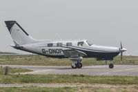 G-DNOP @ EGJB - Taxiing to the west parking at Guernsey - by alanh