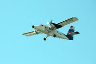 G-BIHO @ EGHE - G-BIHO Twin Otter, Isles of Scilly Skybus in the latest colourscheme arriving in Scilly. - by Pete Hughes