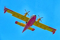 I-DPCO - A Canadair, in anti-fire service, flies over the Campotosto Lake (Abruzzi - Italy) - by Beniamino Trombetta