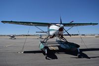 N32PS @ KBOI - With a five blade prop turboprop engine I am sure the performance is pretty good even with the floats on. - by Gerald Howard