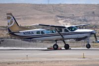 N208JA @ KBOI - Take off run on RWY 28R. Cessna 208B, s/n 208B2174. - by Gerald Howard