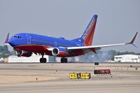 N969WN @ KBOI - Landing touch down on RWY 10L. - by Gerald Howard