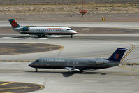 N936SW @ KPHX - Two liveries that will never be seen again. - by Dave Turpie