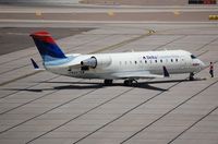 N447SW @ KPHX - Delta Connection CL200 pushed-back - by FerryPNL