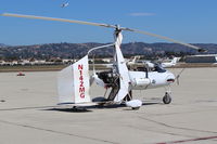 N142MG @ CMA - 1999 Givans PREDATOR Mk 1 powered autogyro one-off design by A&P-not aeronautical engineer. 2-place tandem, Lycoming O-320-B1A 160 hp pusher upgrade. Pilot Vance is CFI for it. - by Doug Robertson