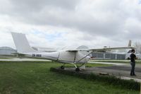 ZK-NKH @ NZAR - outside hangar on blustery day - by magnaman