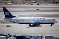 N308AW @ KPHX - US Airways B733 is now a freighter: TS-ICB	with Express Air Cargo - by FerryPNL