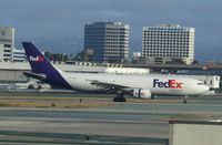 N691FE @ LAX - landing at LAX - by magnaman