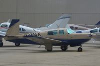 N231TX @ KOSH - Mooney M20K