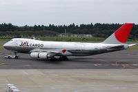 JA402J @ RJAA - JAL Cargo B744F under tow to the maintenance area - by FerryPNL