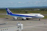 JA8959 @ RJCC - ANA B744 domestic version being waved out. - by FerryPNL