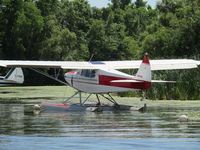 N412SC @ 96WI - on lake at OSH - by magnaman