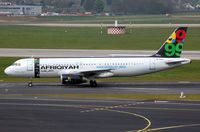 S5-AAA @ EDDL - Afriqiyah Airways operating this Adria A320. - by FerryPNL