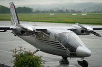 HB-LTQ @ LSZG - On a rainy day at Grenchen airport.