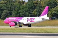 HA-LPM @ LFSB - Airbus A320-232, Taxiing to holding point rwy 15, Bâle-Mulhouse-Fribourg airport (LFSB-BSL) - by Yves-Q