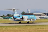 PH-KZL @ LFSB - Fokker 70, Reverse thrust landing rwy 15, Bâle-Mulhouse-Fribourg airport (LFSB-BSL) - by Yves-Q