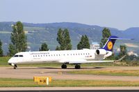 D-ACKI @ LFSB - Bombardier CRJ-900LR, Taxiing to holding point rwy 15, Bâle-Mulhouse-Fribourg airport (LFSB-BSL) - by Yves-Q