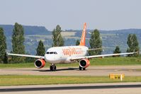 G-EZTE @ LFSB - Airbus A320-214, Taxiing to holding point rwy 15, Bâle-Mulhouse-Fribourg airport (LFSB-BSL) - by Yves-Q