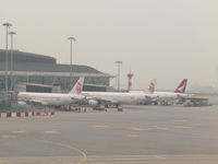 B-HTI @ VHHH - at HKG with pals - by Magnaman