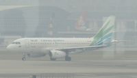 XU-971 @ VHHH - in gloom at HKG - by Magnaman