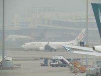 XY-ALB @ VHHH - in engine haze at HKG - by Magnaman
