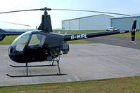 G-WIRL @ EGBJ - G-WIRL   Robinson R-22 Beta [0671] (Rivermead Aviation Ltd) Staverton~G 15/03/2011 - by Ray Barber