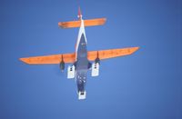 D-CAWI - POLAR 2 D-CAWI viewed from below flying POLAR 4 D-CICE during flight from Puerto Williams SCGZ (Chile) to british antarctic station Rothera. The wheels of the landing gears are positioned on movable plates of the ski for landing on snow. - by Manfred Zimmer