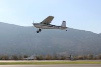 N711JM @ SZP - 1974 Cessna 180J SKYWAGON, Continental O-470 230 Hp, takeoff climb Rwy 04 - by Doug Robertson