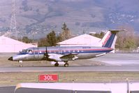 N197SW @ KSJC - EMB-120 at San Jose ready to depart 30L for LAX. Date apprx March 1995 - by Tom Vance