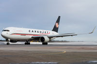 C-FCCJ @ CYQM - Pulling out of the CargoJet ramp to taxi to runway 24 due to 29 being closed due to ice buildup.