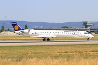 D-ACKI @ LFSB - Bombardier CRJ-900LR, Lining up rwy 15, Bâle-Mulhouse-Fribourg airport (LFSB-BSL) - by Yves-Q
