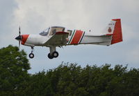G-BPCL @ EGTB - Scottish Aviation Bulldog Series 120 Model 128 landing at Wycombe Air Park. - by moxy