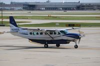 N208EE @ KORD - Cessna 208B - by Mark Pasqualino