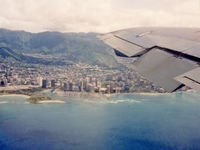 A20-624 @ KHNL - Window View of Honolulu, shortly after take-off from Hickam/Honolulu International Airport (KHNL) on 02Sep1992. Photo taken from RAAF Boeing 707-338C(KC) A20-624 Cn 19624, departing on a 4.4 hour trip to San Francisco KSFO. - by Walnaus47
