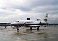 A26-076 @ YSCB - Low res view of RAAF 34 Squadron Falcon 900 A26-076 Cn 076 at her RAAF Fairbairn YSCB 'home-base' on a wet day in 1989. (A Caribou and an 34 Sqn VIP BAC-111-217EA are at rear [either A12-124 or A12-125]). - by Walnaus47
