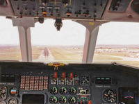 A26-077 @ YSSY - Low Res Flight Deck view of RAAF 34 Squadron VIP Falcon 900 A26-077 Cn 077 during final approach to Sydney YSSY Rwy 16R, at the end of a 0.4 hour flight from Canberra YSCB on 28May1992. Runway visible in centre windscreen panel. - by Walnaus47