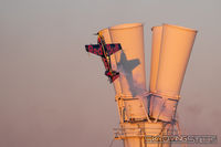 N423KC @ E60 - Kirby Chambliss at pulls up next to the vertical wind tunnel at Eloy, AZ - by Dave G