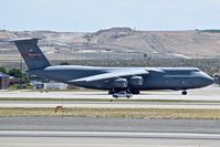 87-0043 @ KBOI - Getting ready to taxi with follow me vehicle driving past. 439th Airlift Wing Patriot Wing, Westover AFRB, MA. - by Gerald Howard