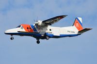 PH-CGN @ EHEH - Dutch Coast Guard DO228 doing some touch and goes. - by FerryPNL
