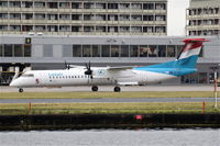 LX-LQI @ EGLC - Departing from London City. - by Graham Reeve