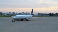 N45440 @ KBDL - United 737 being backed for takeoff at Bradley Airport. - by Michael Laferriere