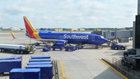 N8527Q @ KBDL - Southwest 737 unloading passengers at Bradley. - by Michael Laferriere