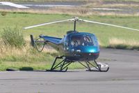 G-LADD @ EGFH - Visiting Enstrom 480 helicopter. - by Roger Winser
