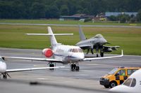 OM-USS @ LOWG - OM-USS (Hawker900XP) with an Eurofighter of the Austrian AF at LOWG - by Paul H